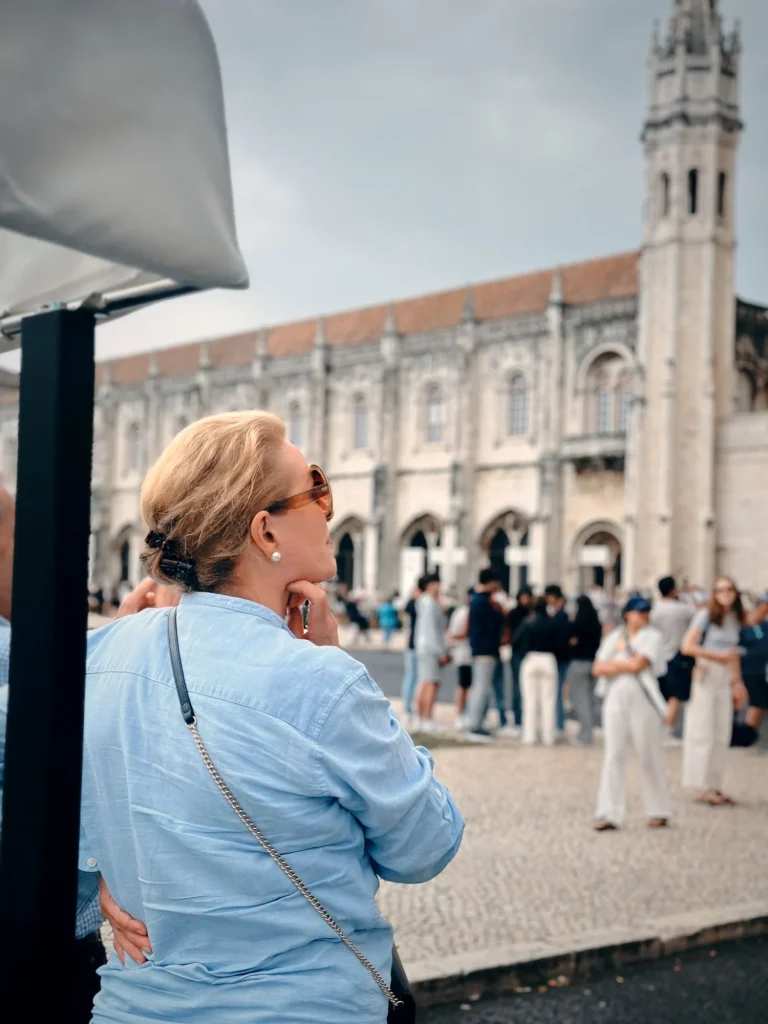 Guests on a Tukxi tuk tuk tour looking at Jerónimos Monastery in Belém