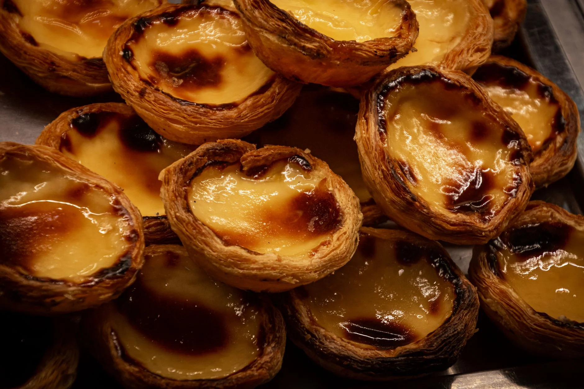 Tray of freshly baked Pasteis de Nata custard tarts