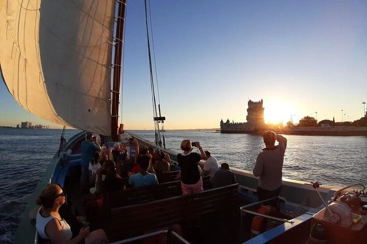 Traditional Lisbon boat on a sunset cruise on the Tagus River