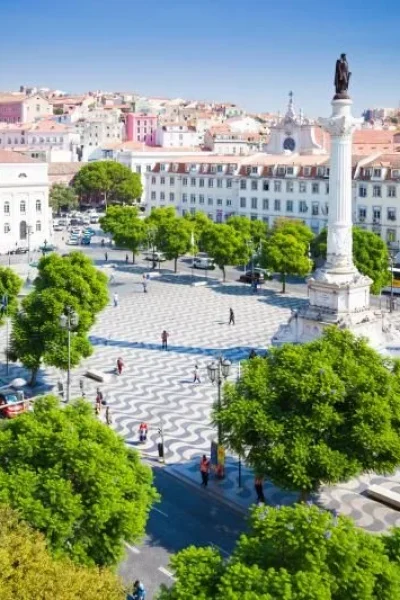 Aerial view of Rossio Square in Lisbon, with its wave-patterned pavement, central column and surrounding historic buildings